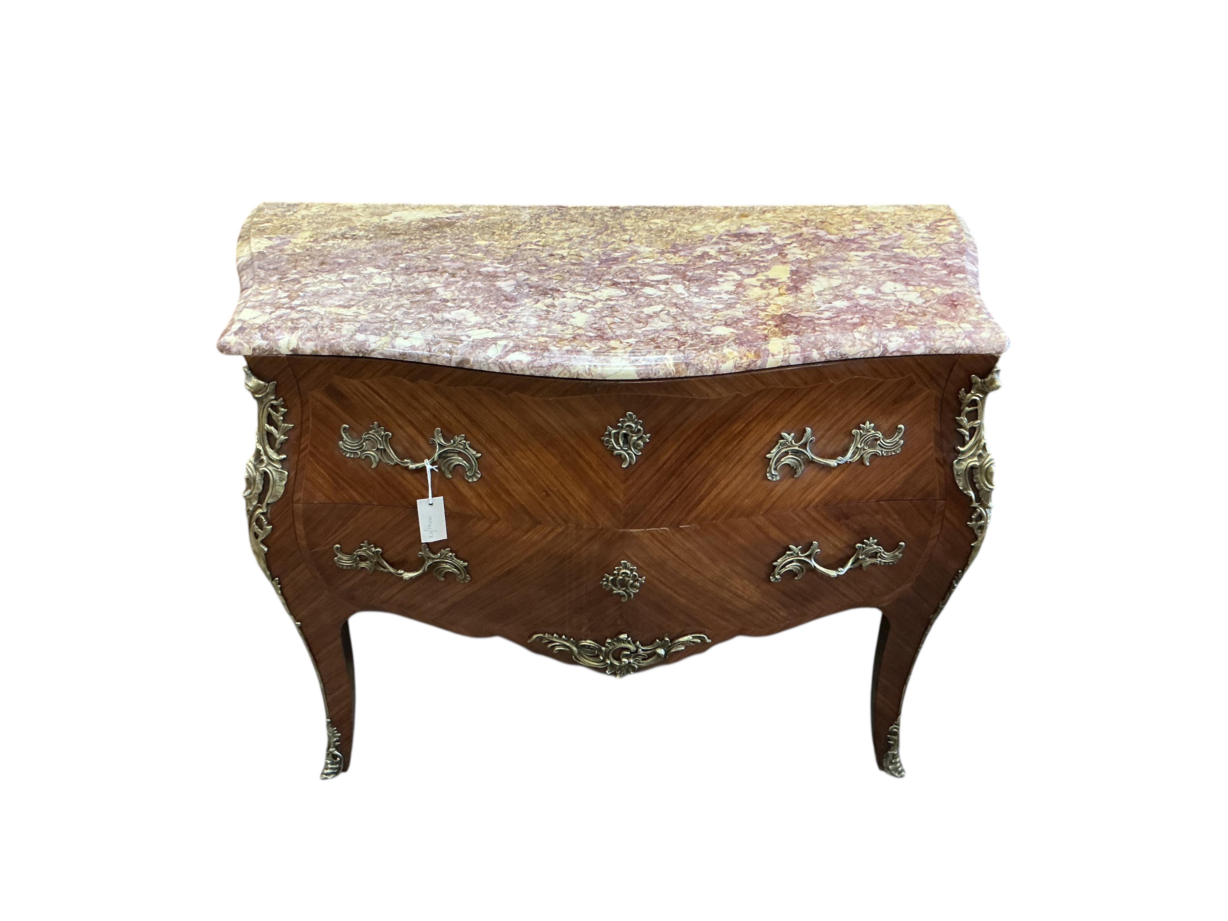 A Louis XV style gilt metal mounted marble top kingwood bombe commode, width 116cm, depth 53cm, height 86cm